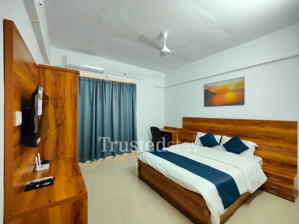 Bedroom of Govind Paradise TrustedStay Service Apartment in Kopar Khairane, Navi Mumbai